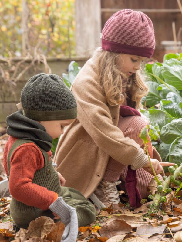 Căciulă Disana din lână Beanie Cassis Rose